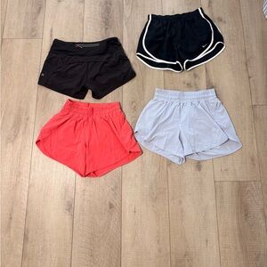 3 Pairs of Lululemon athletica Black, Orange, Blue Women's Shorts, 1 Nike short